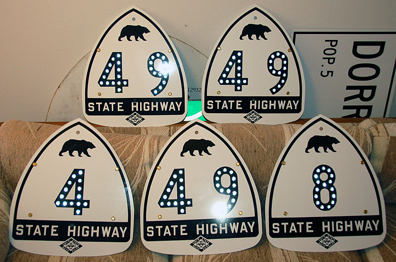 California - State Highway 8, State Highway 49, and State Highway 4 sign.