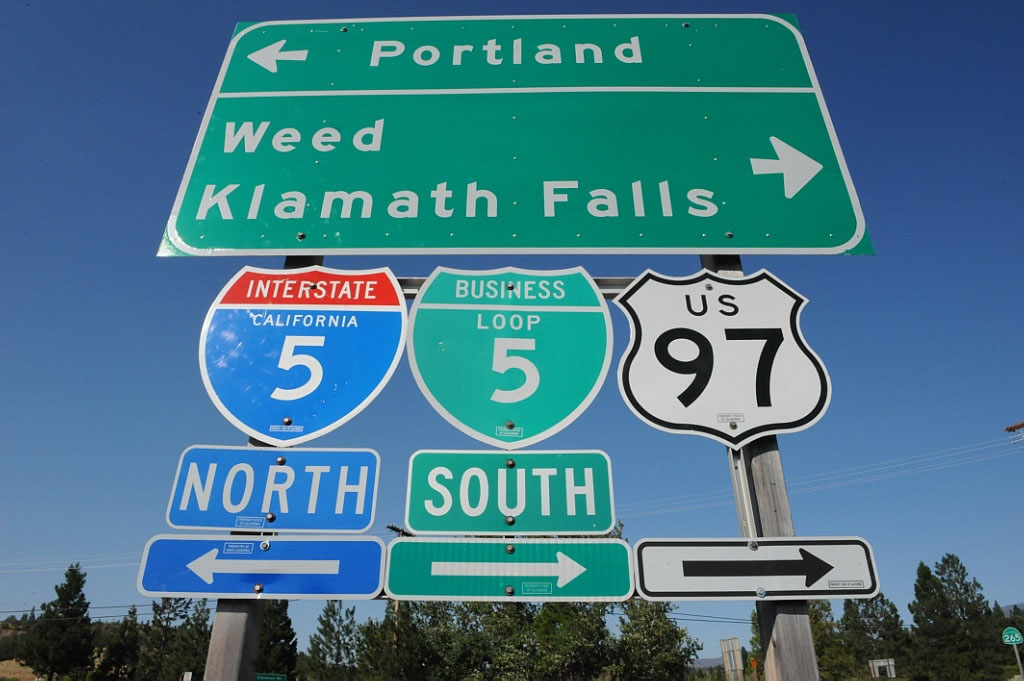California - U.S. Highway 97, business loop 5, and Interstate 5 sign.