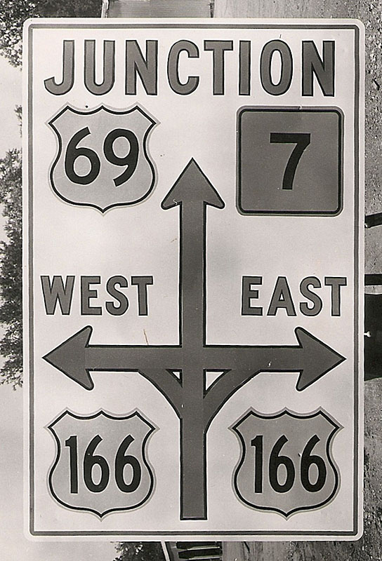 Kansas - U.S. Highway 166, State Highway 7, and U.S. Highway 69 sign.