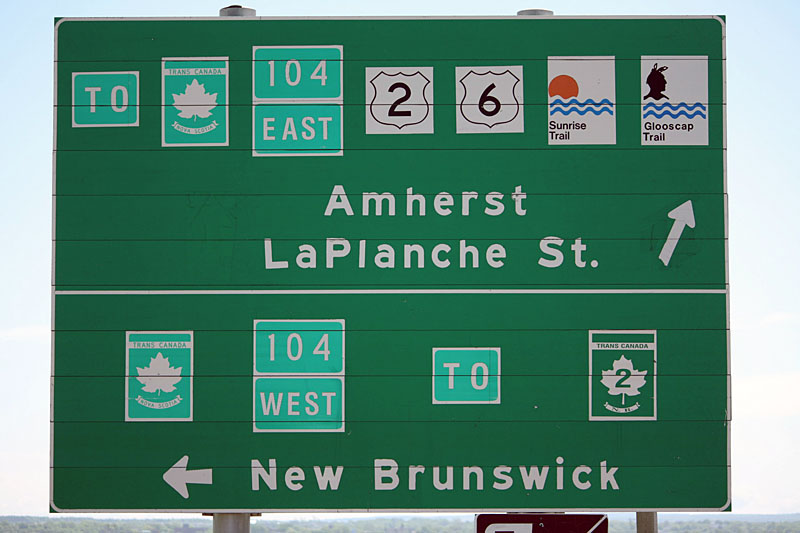 Nova Scotia - Trans-Canada Route 0, Glooscap Trail, Sunrise Trail, Provincial Highway 6, Provincial Highway 2, and provincial secondary route 104 sign.