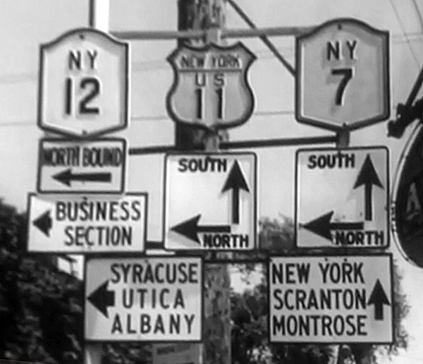 New York - U.S. Highway 11, State Highway 12, and State Highway 7 sign.