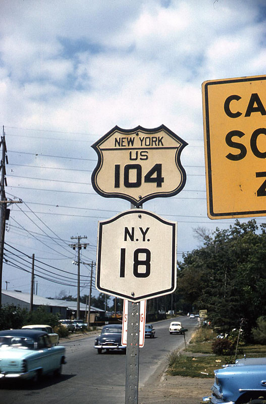 New York - State Highway 18 and U.S. Highway 104 sign.