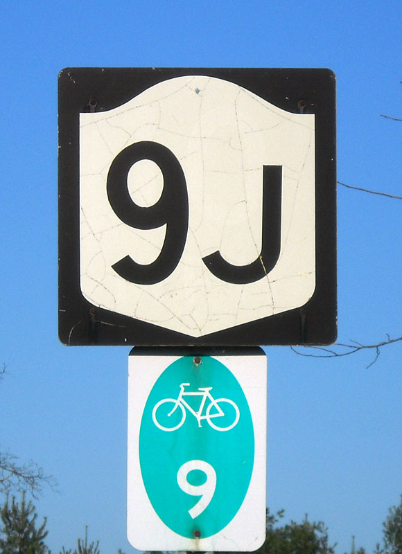 New York - bicycle route 9 and state highway 9J sign.