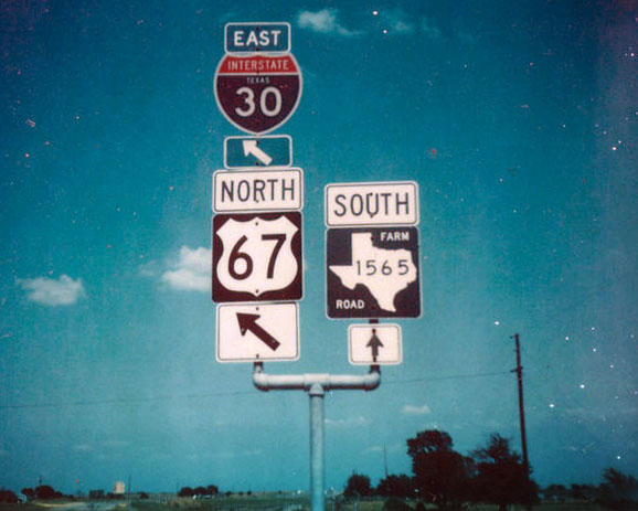 Texas - farm to market road 1565, U.S. Highway 67, and Interstate 30 sign.