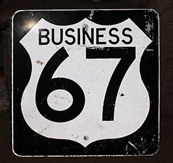 Texas business U. S. highway 67 sign.