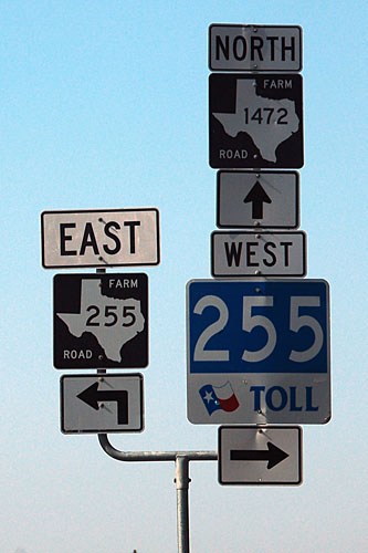 Texas - toll road 255, farm to market road 1472, and farm to market road 255 sign.