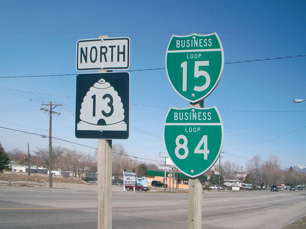 Utah - Interstate 84, business loop 15, and State Highway 13 sign.