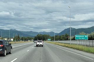 Glenn Highway shifts northwest from adjacent Boundary Avenue to the DDI with Muldoon Road.