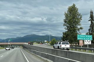 The DDI at Muldoon Road replaced a six-ramp parclo interchange with separate exits for Muldoon Road north and southbound from SR 1.