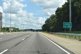 U.S. 78 turns west onto the Bankhead Highway where Arkadelphia Road intersects SR 378 (Finley Boulevard) at Thomas. SR 5, not shown on Exit 123 guide signs, combines with U.S. 78 west from U.S. 11 north. SR 5 follows Old U.S. 78 north from I-22 to the Walker County seat of Jasper.