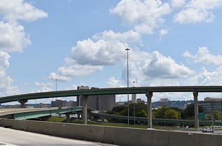 High flyovers constructed at the interchange locally known as Malfunction Junction serve local exits and entrance ramps from the Birmingham street grid. 