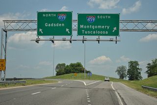 Exit 136 separates with a single lane ramp for Interstate 459 south to Mountain Brook and Bessemer and a two lane flyover for I-459 northbound to Alton and northeast Birmingham.