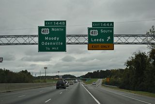 U.S. 411 south ties into U.S. 78 at Downtown Leeds, 0.4 miles west of SR 25  (Dunnavant Road) south to the communities of Vandiver, Sterett and Calcis. SR 25 is the hidden state route counterpart of U.S. 411 northeast to the Georgia state line.