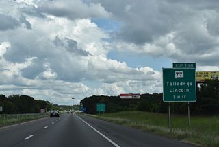 The diamond interchange at Exit 168 connects I-20 east with SR 77 in one mile. SR 77 travels 112.33 miles overall between U.S. 431 at Attalla and U.S. 431 at Lafayette.