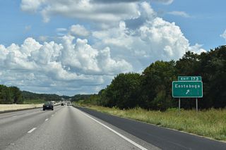 Talladega County Route 005 (Eastaboga Road) leads south 3.5 miles to Turner and 8.6 miles to the SR 275 (Talladega Bypass) outside of the county seat.