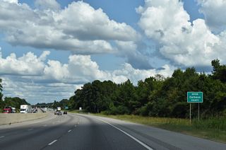 Curving northward by Anniston Regional Airport (ANB), Interstate 20 enters Calhoun County. 