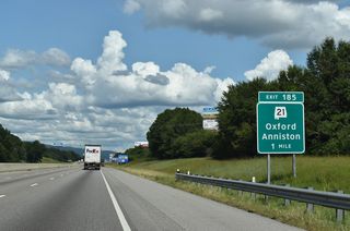 SR 21 (Quintard Drive) meets I-20 at a parclo interchange (Exit 185) in one mile. SR 21 north intersects U.S. 78 in 0.35 miles. Prior to 2016, U.S. 431 overlapped with SR 21 north to Anniston and with U.S. 78 east beyond Oxford.