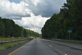 The diamond interchange (Exit 199) with SR 9 (Almon Street) near the Cleburne County seat of Heflin is 0.7 miles east of the I-20 bridge across Cahulga Creek.