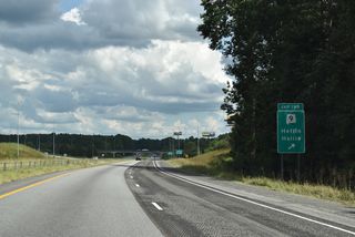 SR 9 heads 1.5 miles north to a 4.3 mile long overlap with U.S. 78 west between Old Davisville and Heflin. SR 9 continues north from U.S. 78, 21 miles to Piedmont and 38 miles to Centre. South from Exit 199, SR 9 travels nine miles to U.S. 431 at Hollis Crossroads and 25 miles to Lineville.