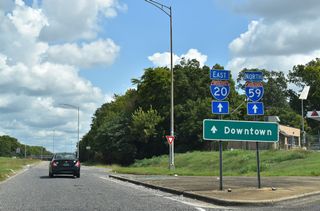 The I-59 Service Road extends east from Avenue V to 19th Street Ensley and the northbound entrance ramp for I-20/59 at Avenue Y.