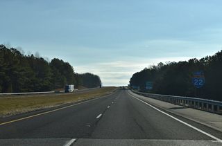 Interstate 22 enters Marion County, Alabama south of McRae Lake.