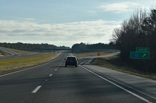 CR 33 leads southwest from Exit 3 to CR 94 (Old U.S. 78) near Bexar, and south from there to SR 19. Northward the CR 33 ties into CR 11 nearby. CR 11 continues north to Shottsville.
