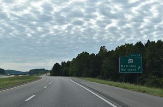SR 17 combines with U.S. 43/278, 3.54 miles to the east. The three routes overlap along Military Street north through Downtown Hamilton. Southward SR 17 continues 21 miles to Sulligent and U.S. 278.