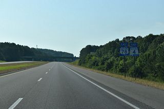 Shields for U.S. 78/SR 4 and Interstate 22 precede the County Route 11 overpass east of Exit 11. CR 11 previously crossed the freeway near Exit 3.