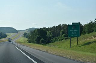 SR 44 travels 1.14 miles west from Exit 22 to overlap with SR 253 for 0.45 miles in the town of Twin. SR 253 continues southward into the city of Winfield.