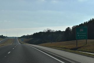 Meeting the freeway next at Exit 30 is SR 129, a north to south route linking Brilliant and Winfield.