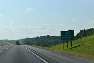 SR 233 ends 9.72 miles to the north of Exit 34 at U.S. 278 near the settlement of Sunny Home.