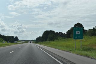 SR 118 continues alongside Interstate 22 from Exit 52 east to Exit 57 and western Jasper. The lack of control cities reflects the local use of the state route, which overlays Old U.S. 78.