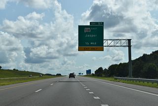 A lane drop occurs along I-22 east at Exit 57 for SR 118. SR 118 constitutes a four lane arterial east to SR 69 (Elliot Boulevard) in Jasper. SR 69 overtakes Old U.S. 78 east to a diamond interchange with SR 5 north and 9th Avenue south.