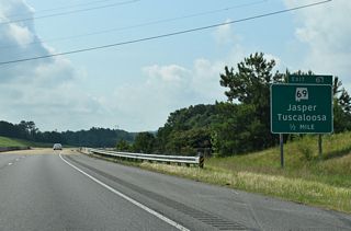 West from the diamond interchange (Exit 61) with Interstate 22, SR 69 travels to the nearby community of McCollum, where SR 124 branches west.
