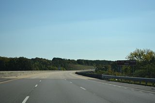 The Dr. David Jack Rowland Bridge takes Interstate 22 across Town Ceek and a Norfolk Southern Railroad line to the immediate east of Exit 63.