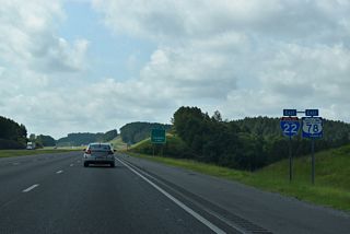 Interstate 22 confirming marker posted ahead of Frog Ague Creek, south of Cordova.