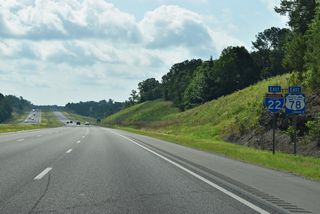 Interstate 22 travels south by the settlement of Barney.