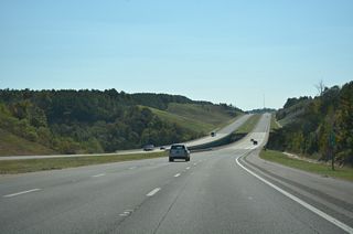 Interstate 22 spans the Mulberry Fork of the Black Warrior River just east of mile marker 74. This waterway flows 102 miles southwest from Cullman County, near Arab, into Bankhead Lake.