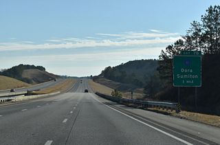 The diamond interchange at Exit 78 connects I-22/U.S. 78 with Walker County Route 81, one mile east of Burnt Cane Creek.