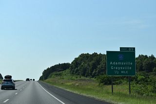 Hillcrest Road weaves through residential areas south to an interchange with U.S. 78/SR 5 at Minor Parkway in Adamsville.