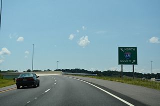 Heading north from I-22, I-65 travels 76 miles to Interstate 565 at Huntsville.