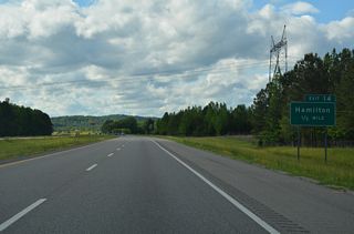 Continuing southwest from Exit 14 and Hamilton, CR 35 travels to Henson Springs and SR 17 north of Sulligent.