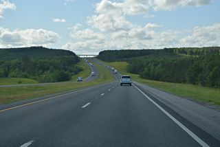 I-22/U.S. 78 ascend from Copper Creek across northern reaches of the Guin city limits.
