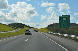 I-22/U.S. 78 advances through western reaches of the Brilliant town limits to the diamond interchange (Exit 26) with SR 44. SR 44 travels 10.00 miles between U.S. 43 in Guin and SR 129 in Brilliant.