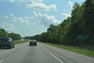 Collinsville, the last exit in DeKalb County, follows in 14 miles. Gadsden is 39 miles away via I-59 and U.S. 278/431 east.