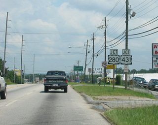 Progressing east through Ladonia, U.S. 80 (Crawford Road) expands into a five lane commercial boulevard to Phenix City. U.S. 80 turns northward alongside U.S. 280/431 along the Phenix City bypass to circumvent both Downtown Phenix City and Columbus, Georgia.