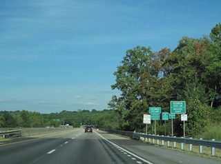 Spanning the Chattahoochee River, U.S. 80 (J.R. Allen Parkway) enters the city of Columbus and Muscogee County in the state of Georgia. The state line also doubles as the boundary between Central and Eastern Time Zones.