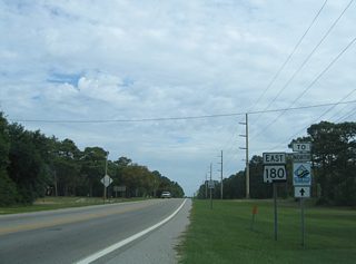 Traveling northbound on SR 180 (East Second Street) beyond State Park Road (old SR 135). A second Foley Beach Express trailblazer was posted (removed by March 2009) along SR 180 eastbound for the Intracoastal waterway toll bridge and four lane expressway from Orange Beach northward to SR 59 near Summerdale.
