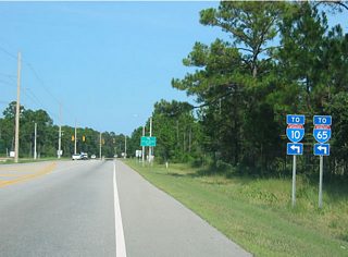 Interstate 10 and 65 trailblazers posted at the onset of the Foley Beach Express southern terminus along SR 180 eastbound. The two lane span across the Intracoastal Waterway (Portage Creek) includes a toll charged for all passenger vehicles. The connection with SR 59 north from Foley guides motorists to Interstates 10 and 65.
Construction commenced in 2009 on the Baldwin Beach Express extension of the four lane corridor along CR 28 and 83.