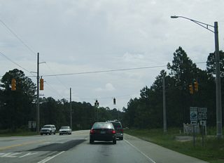 SR 180 (Canal Road) eastbound at the Foley Beach Express. The north-south road travels 17.5 miles between Canal Road and SR 59 near Summerdale. Vehicles carrying hazardous materials are prohibited from using the two lane span.